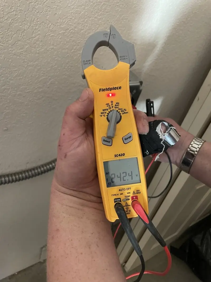 Voltage testing with clamp meter during Aluminum Wiring Replacement in Groesbeck